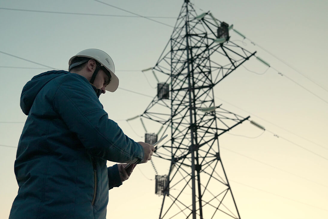 Repairman fixing telephone lines
