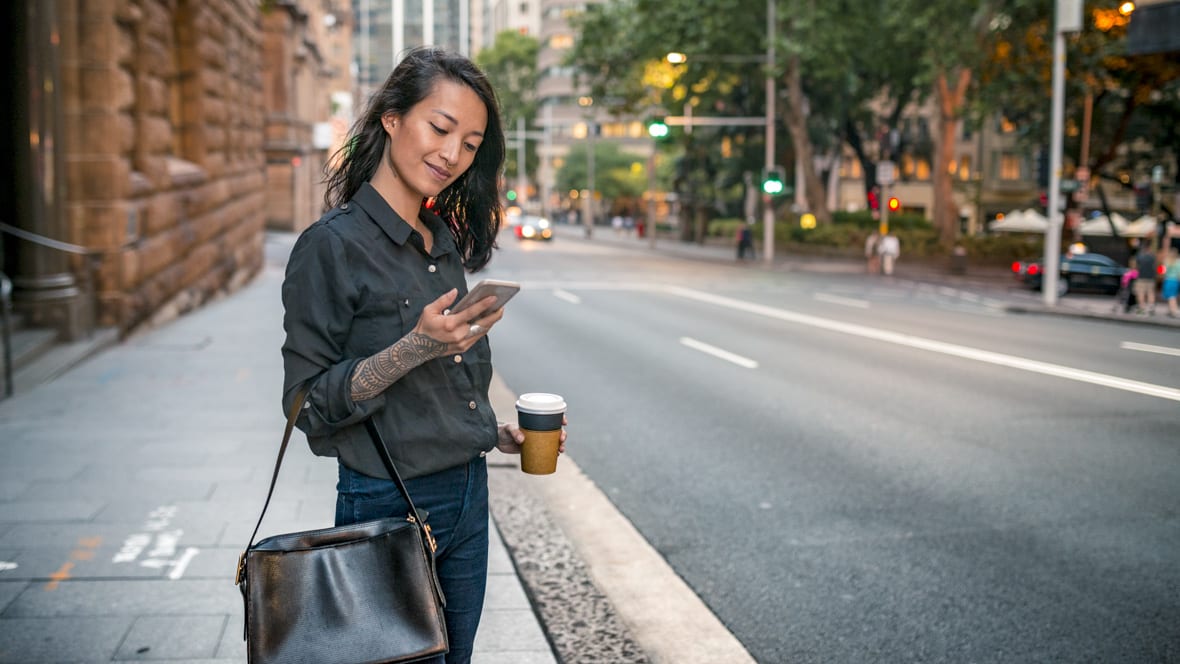 Business customer checking a phone